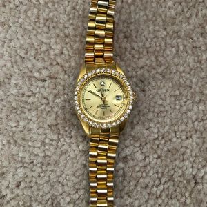 Gruen gold toned diamond bezel stainless steel ladies watch